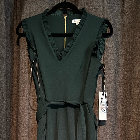 Calvin Klein Pants - Calvin Klein , size 10, green jumpsuit NWT, ruffled vneck pant suit